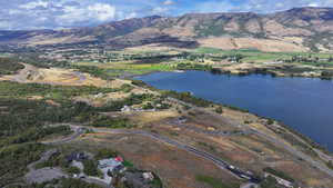 Bird's eye view featuring a water and mountain view