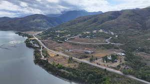 Property view of mountains featuring a water view