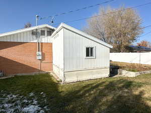 View of home's exterior featuring a yard