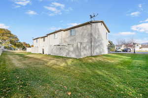 View of home's exterior featuring a yard