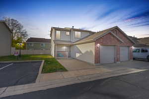 View of property featuring a garage