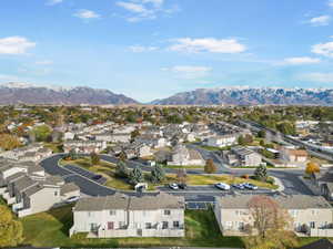 Birds eye view of property with a mountain view