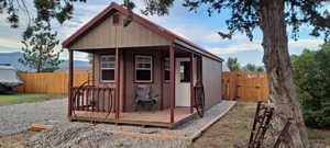 View of outbuilding featuring a mountain view