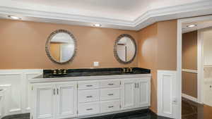 Bathroom featuring vanity and tile patterned floors