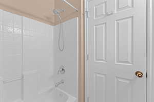 Bathroom featuring shower / bathtub combination