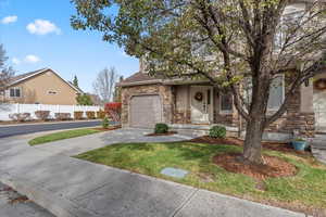 View of front of home featuring a garage