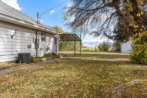 View of yard featuring a mountain view and cooling unit