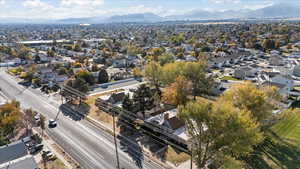 Birds eye view of property with a mountain view