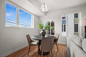 Dining space featuring dark hardwood / wood-style floors