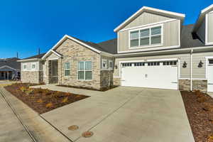 Craftsman-style house with a garage