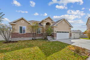 View of front of home featuring a front lawn