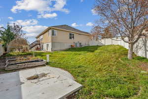 View of yard featuring a patio area and cooling unit