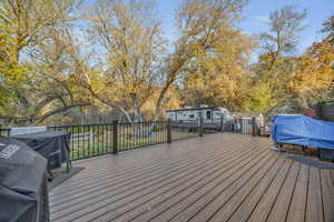 Deck featuring a grill