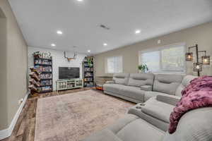 Living room featuring hardwood / wood-style floors