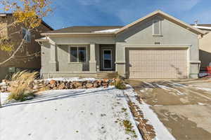 View of front of home with a garage