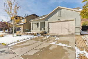 View of front of property featuring a garage