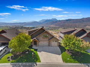 View of front of house featuring a mountain view