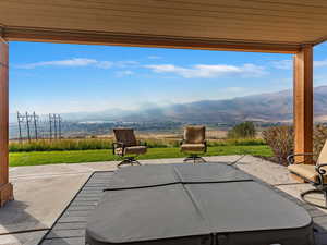 View of patio / terrace featuring a mountain view