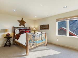 View of carpeted bedroom