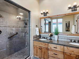 Bathroom featuring vanity and walk in shower