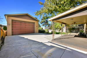 Garage with ceiling fan and central AC