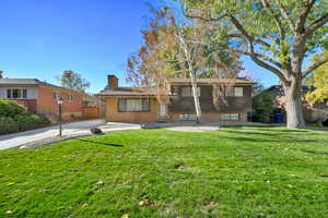 View of front of house with a front lawn