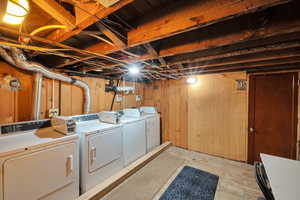 Basement shared laundry room.