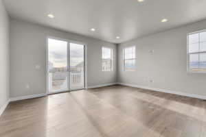 Empty room featuring light hardwood / wood-style flooring