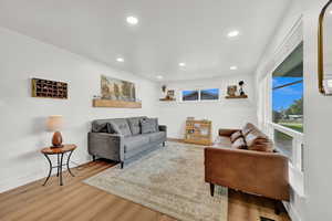 Living room featuring hardwood / wood-style flooring