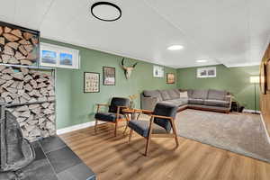 Living room with hardwood / wood-style floors