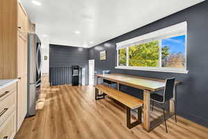 Dining room with light wood-type flooring