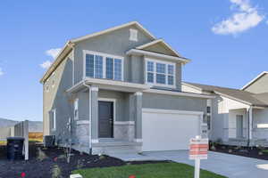 View of front of home with a garage