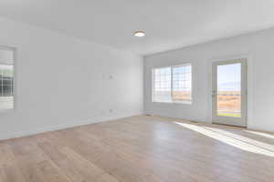 Spare room featuring light hardwood / wood-style flooring