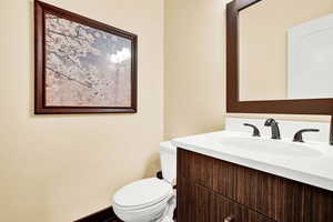 Bathroom featuring vanity and toilet