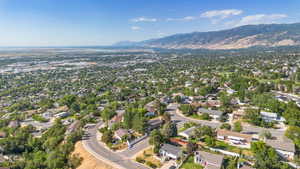 View of property location with a mountainous background and nearby suburban area