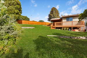 View of yard featuring a deck