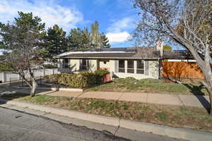 Single story home featuring paid for solar panels