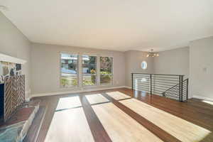 Beautiful fireplace, hardwood floors and tons of natural light