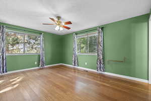 Largest of the five bedrooms with tons of natural light and views