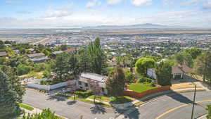 Aerial perspective of suburban area with a mountainous background