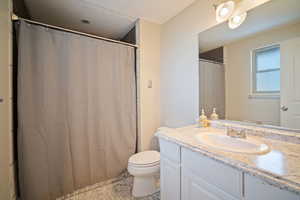 Tile shower with granite countertops to enjoy