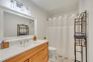 Bathroom with vanity and toilet