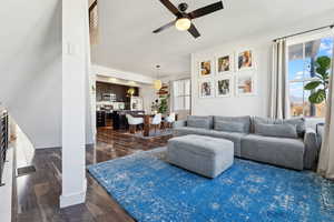 Living room featuring natural light and vaulted ceilings