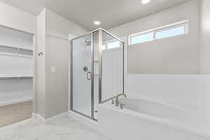 Bathroom with plus walk in shower