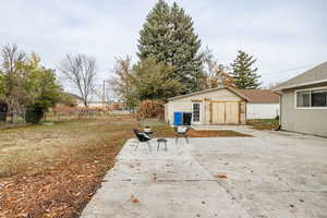 Exterior space featuring an outbuilding