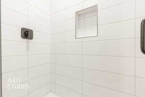 Bathroom with a tile shower