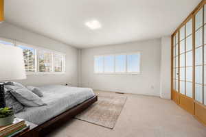 View of carpeted bedroom