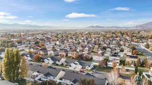 Birds eye view of property with a mountain view