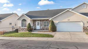 Single story home with a garage