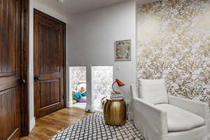 Sitting room featuring light hardwood / wood-style flooring